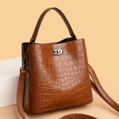 包包女包新款2026斜挎包女时尚石头纹女士水桶包单肩包女