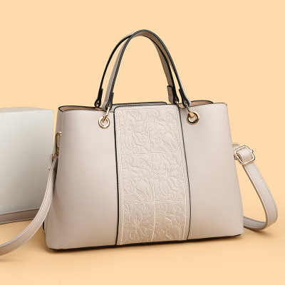 包包女包新款2026高档压花单肩包时尚大容量手提包女欧美