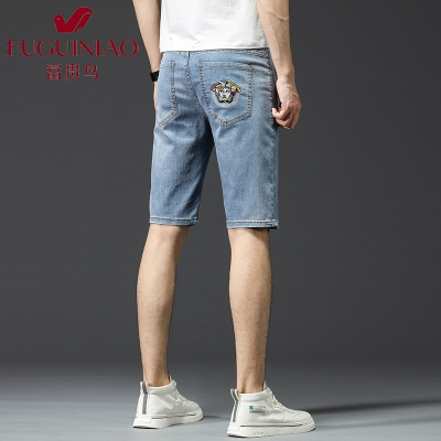 富贵鸟(FUGUINIAO)夏季刺绣蓝色牛仔短裤男潮牌个性五分裤中裤马裤修身绣花男士裤子