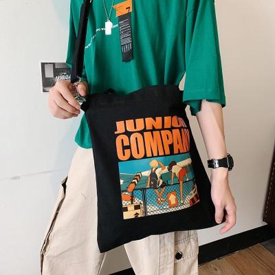 派尼美特帆布袋ins中包斜挎日系男士背包韩版文艺单肩包简约手提袋情侣包