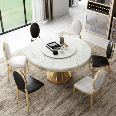 轻奢北欧大理石餐桌椅组合后现代简约圆桌饭桌家用圆形不锈钢餐桌
