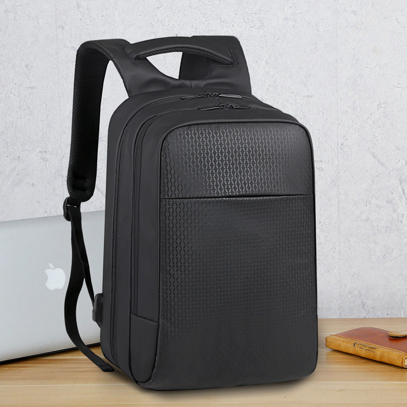 大容量多功能手提充电商务电脑背包旅行通勤反光防水休闲男女双肩