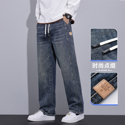 2025新款高档男牛仔裤松紧腰舒适垂感拼接抽绳宽松高街男生阔腿裤