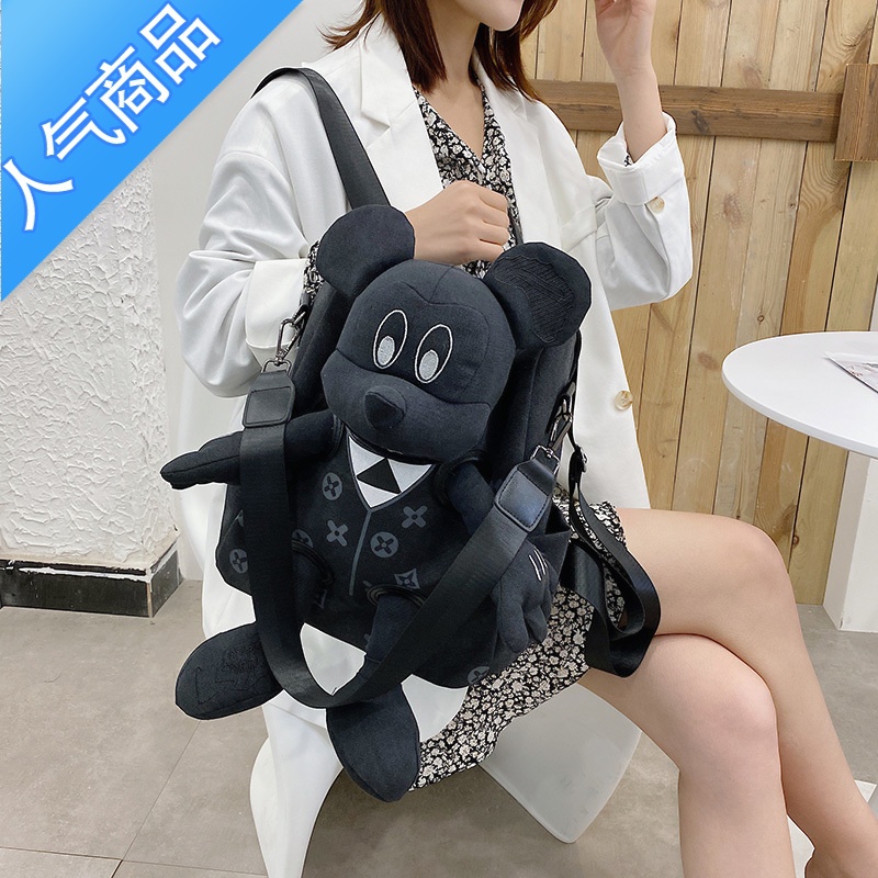 封后潮牌2022新款米奇帆布时尚学生双肩包女休闲撞色大容量公仔书包女书包学生