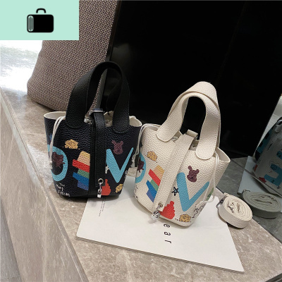 质感包包女2020新款荔枝纹手提单肩水桶包可爱卡通百搭单肩斜挎包NEW LAKE女士单肩包