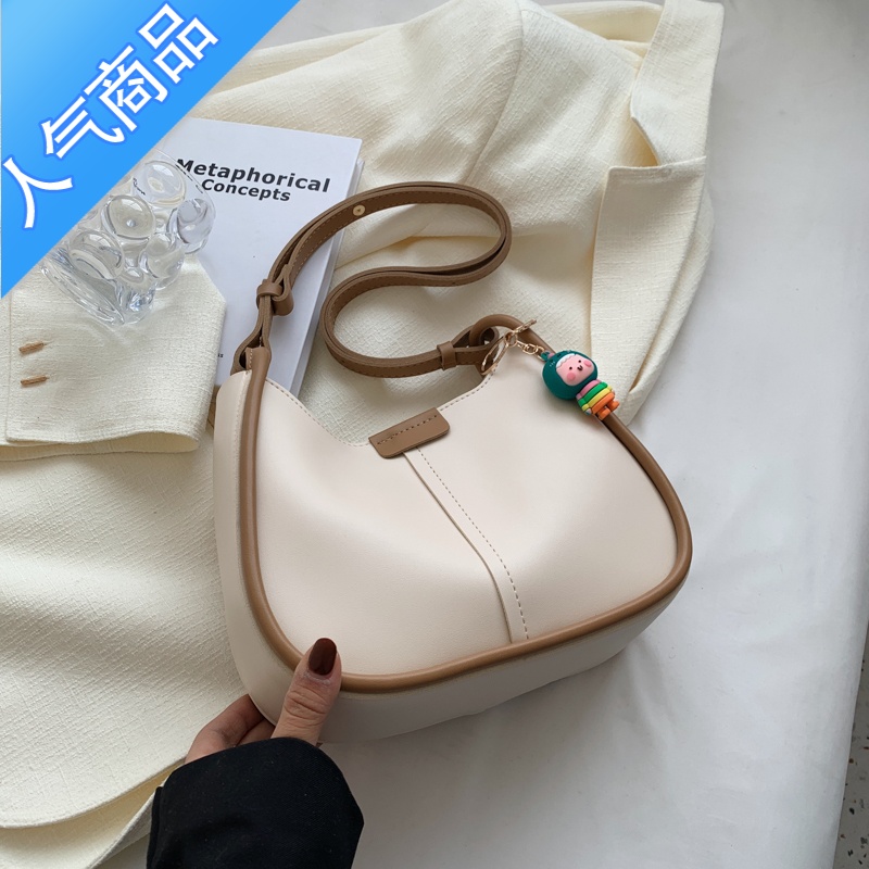 封后感小众单肩包包女夏2022新款通勤休闲百搭斜挎包大容量水桶包
